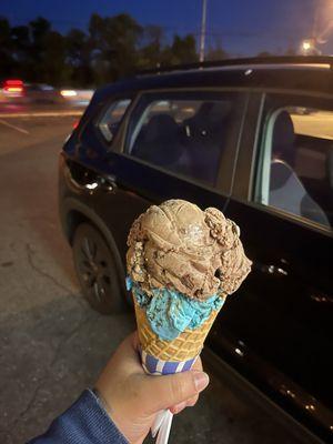 Waffle cone with Cookie Monster and double dunker. Cookie Monster is vanilla with Oreos and cookie dough. Double is coffee.