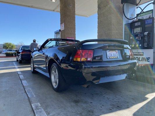 My Cobra pumping gas at Costco