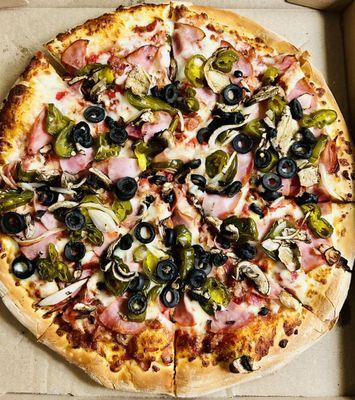 Create Your Own: Canadian bacon, black olives, onions, mushrooms and jalapeños