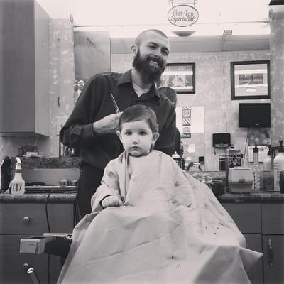 My little boy getting a stellar hair cut from the best barber in Aurora. As long as his hair keeps growing I'll keep taking him to Ivan's.