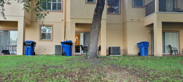 Trash cans by back doors. Flys always in unit.