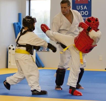 Master Instructor Shane Hudson teaching Youth Tae Kwon Do.