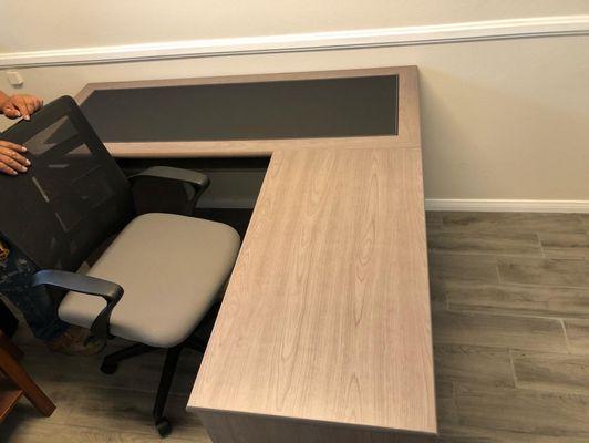 Built L-Shaped office desk and office chair.