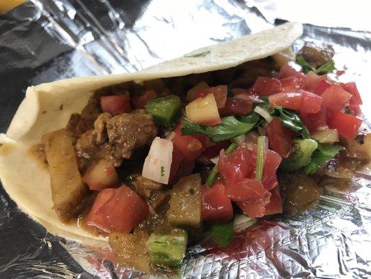 Cubed seasoned pork simmered in tomatillos, roasted jalapenos, cilantro, onions, potatoes and chicken stock.