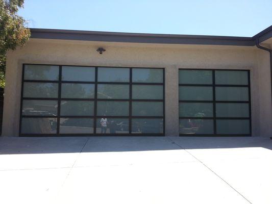 Glass privacy garage doors