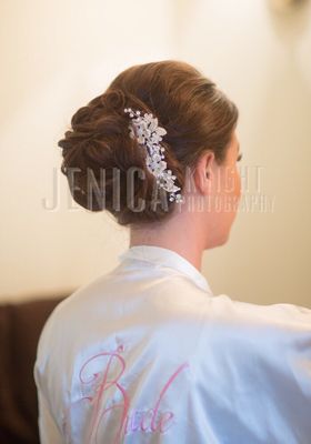 Bridal updo by or amazing stylist and owner Kim Bidleman.