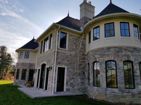 Combination of Stone, Stucco and Precast residence.Project in BROOKVILLE NY.
 Learn more at:www.castrostonework.com