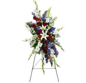 A beautiful red, white and blue spray to pay tribute to your loved one.