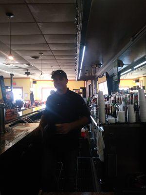 Brian behind the bar