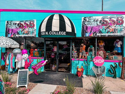 You can't miss our store! It's the only turquoise & pink building in town