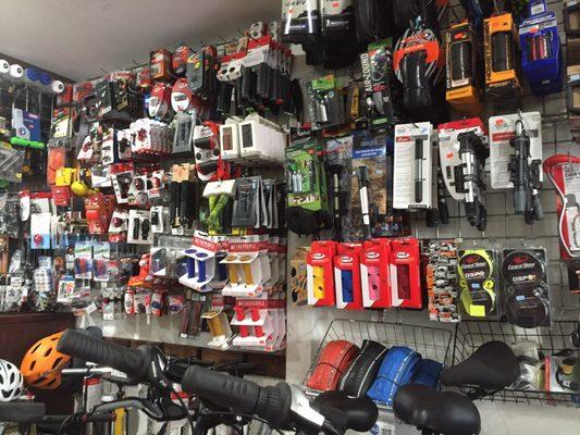 Wall of bike accessories for sale at Jersey Cycles Nov 2016