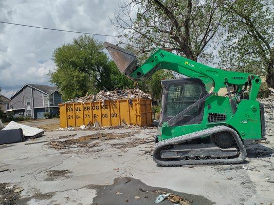 Finishing the cleanup of a building demolition