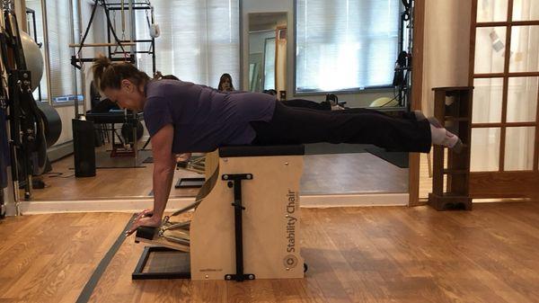 My client, Linda demonstrates great thoracic & hip extension, on the stability chair