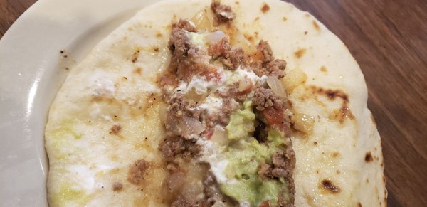 Inside a picca dillo taco and I added sour cream and avocado