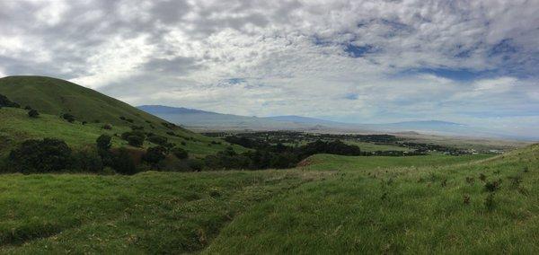 View of Mauna Kea, Mauna Loa, and Hualalai from the Kohala mountain.