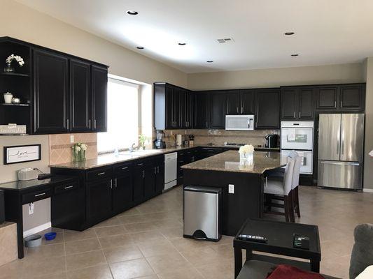 Light maple kitchen refinished to dark espresso.