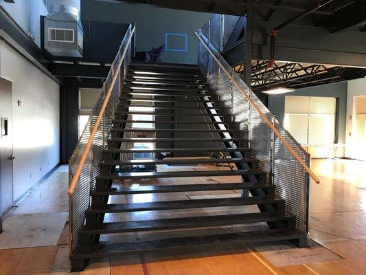 Main staircase. Handrails & panels installed by Eastside Fabrication.