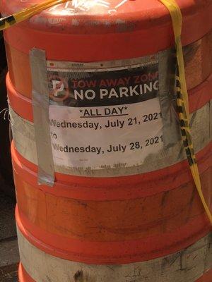 Their "parking permit" that they change weekly to save spots for their crew