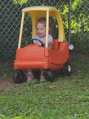 Outdoor play in the Cozy Coupe.