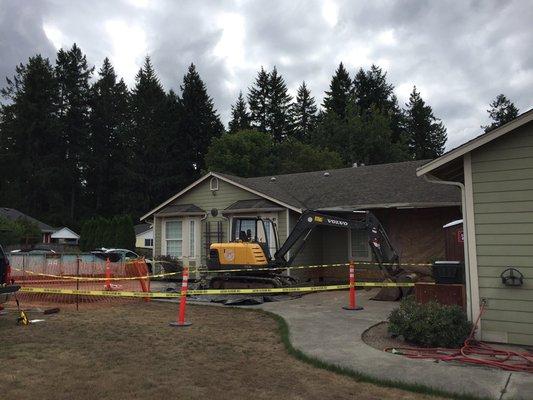 Environmental remediation after a dump truck collided into this home.