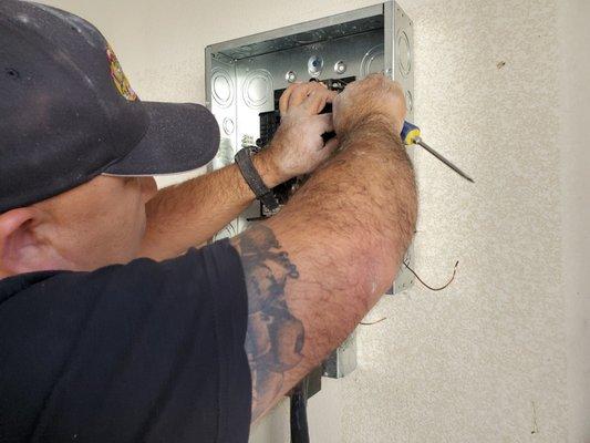 Jose, our Installer,  wiring in a new sub panel.