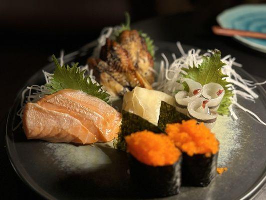 Salmon, unagi, and needlefish Sashimi. Smeltfish roe