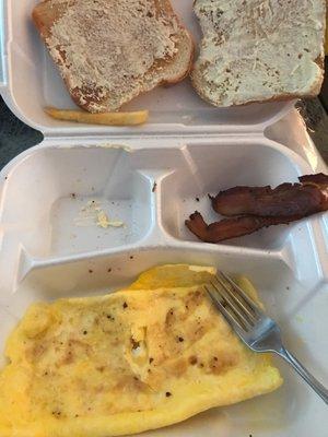 Bacon plate. They were out of grits so I substituted hash browns, but as you can see, we didn't get them. Horrible customer service.