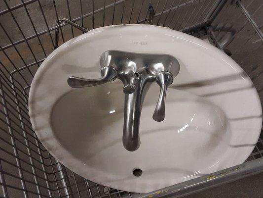 Part of my haul: a Kohler sink with hardware. Not exactly what I want, but for $8, I love it!