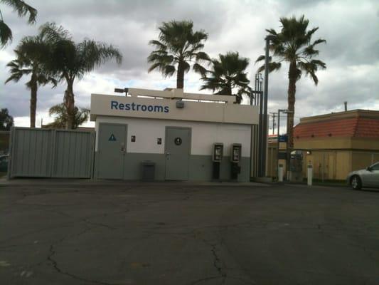 Bathrooms. Separate building out on corner of parking lot.