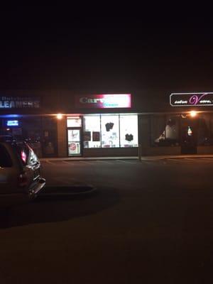 Front of the establishment at night