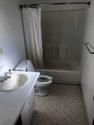 Bathroom with a great hot shower and plenty of room for getting ready. Even space for luggage in open area under the counter (not visible.)