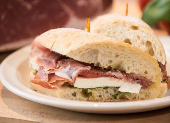 Campania Panino has prosciutto, mozzarella, tomatoes, basil and olive oil