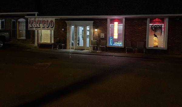 Front of shop at night