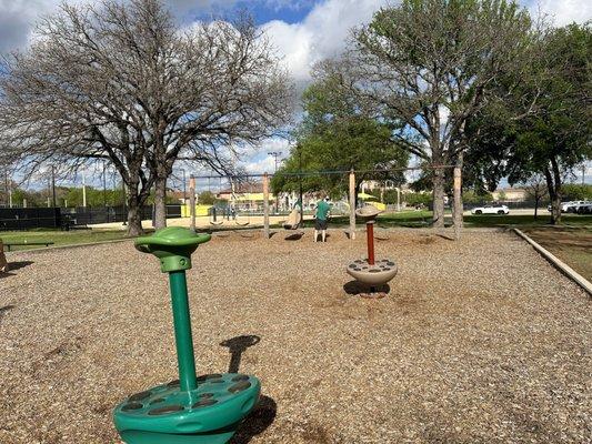 Two sets of swingsets for big and little kids