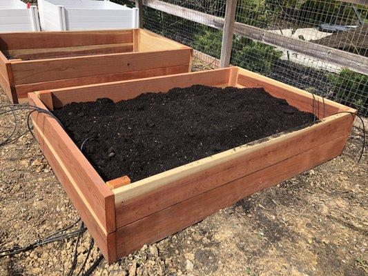 Our raised garden beds with their soil - fun weekend project.