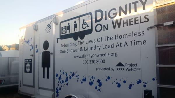 Decals by Daneen placed on the Dignity On Wheels mobile shower and laundry trailer for the homeless. We love it!