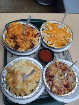 Bacon cheddar; buffalo chicken; pepperoni pizza; four cheese (clockwise from left upper)