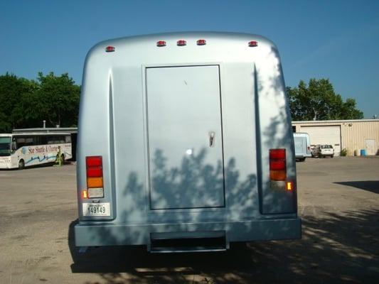 Rear photo of luxury bus from Star Shuttle's luxury charter division, Abbey Walker.