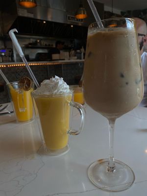 Iced Latte with Vanilla Bean and caramel Fresh mango smoothie with almond milk