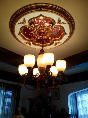 Custom medallion and chandelier installation.