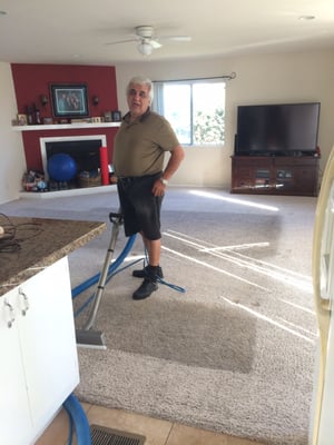 Ali cleaning my VERY dirty carpet.