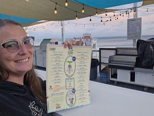 Me with the menu at the beach bar