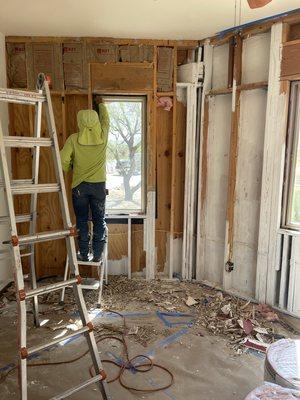 Removing damaged drywall and termite damage to repair drywall and paint .