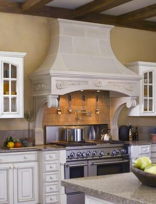 Florentine cast stone range hood by Old World Stoneworks