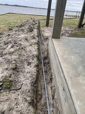 Underground conduit servicing boat dock