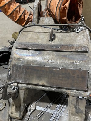 Repairs on excavator grapple