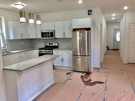 New FULLY remodeled Kitchen. (New Electrical, lighting, Plumbing, Island, Soft closed cabinets...)