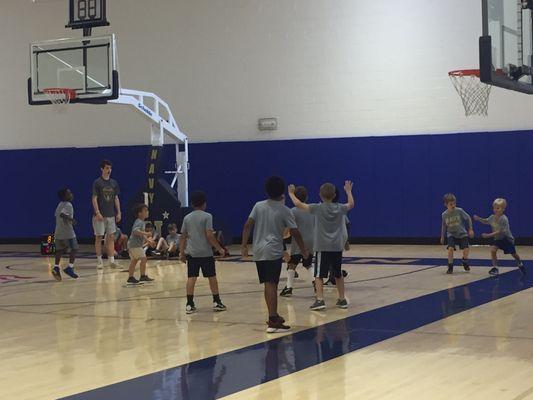 Little kid 5v5 where both teams wear the same color shirt.