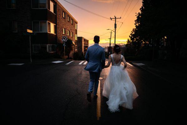 Bride and groom run into the sunset  | JTobiason Photography