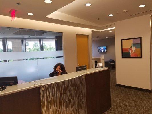 Our friendly receptionists, and comfortable waiting area.